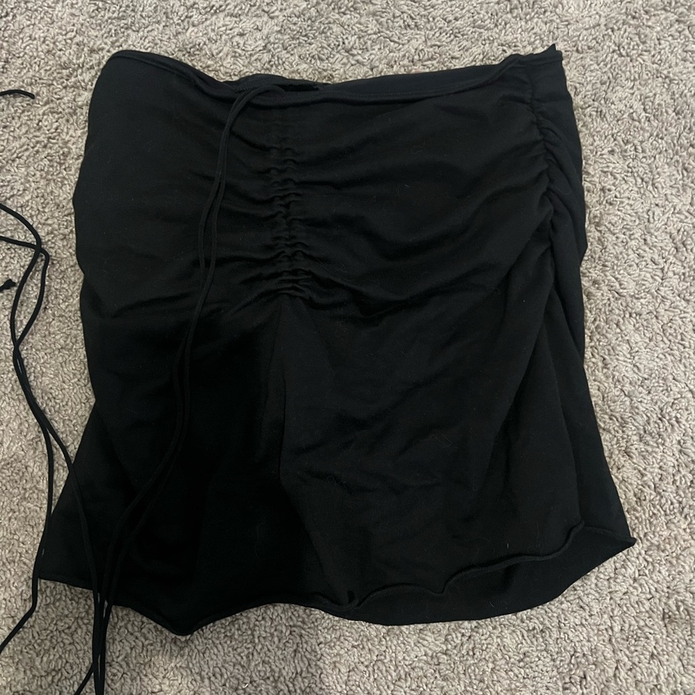 small black skirt with adjustable string for how high or low you want it